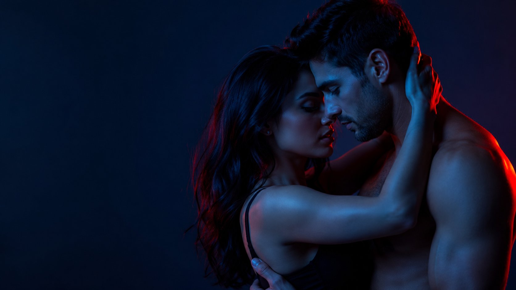 Couple together in low light